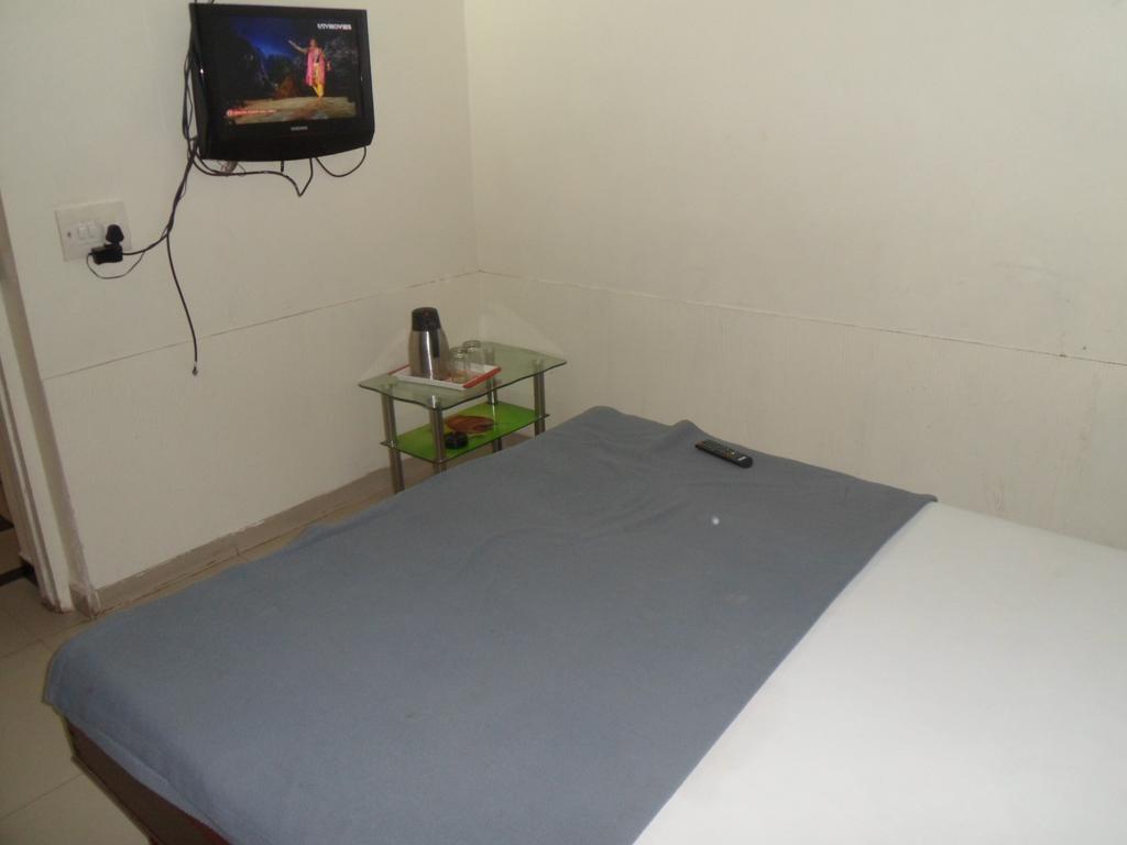 Hotel Atithi Ahmedabad Quarto foto