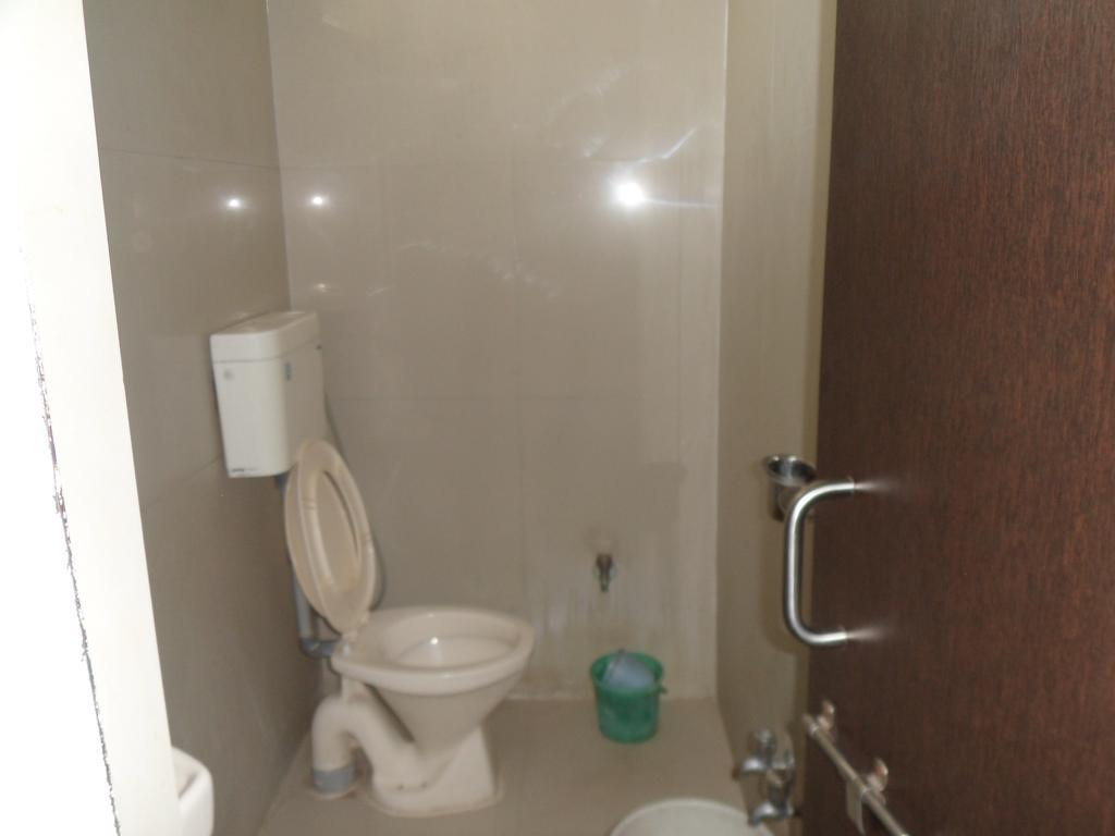 Hotel Atithi Ahmedabad Quarto foto